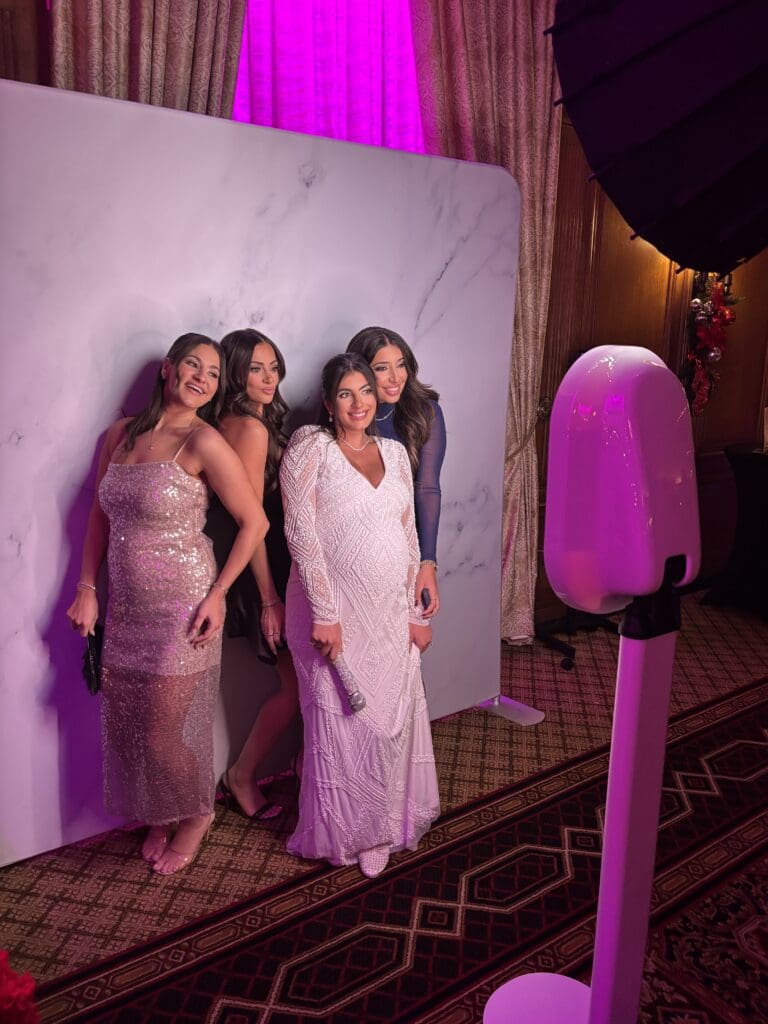 Woman at a Digital Photo Booth with Average Photo Booth Cost in 2026 Pricing Guide & Tips
